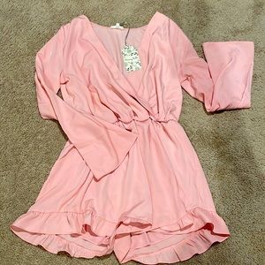 Pink long sleeved romper